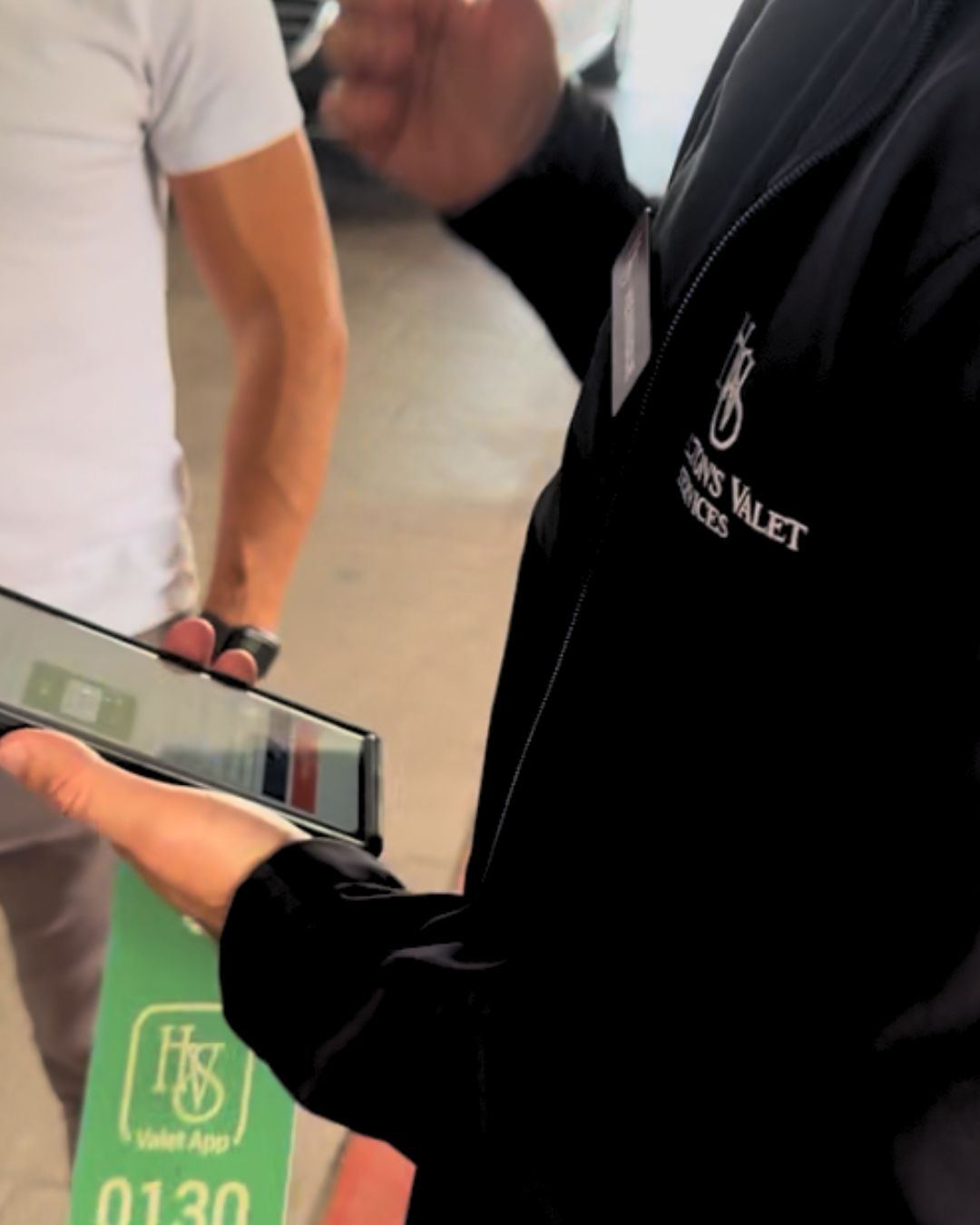 HVS attendant logging a guest's car in the valet app